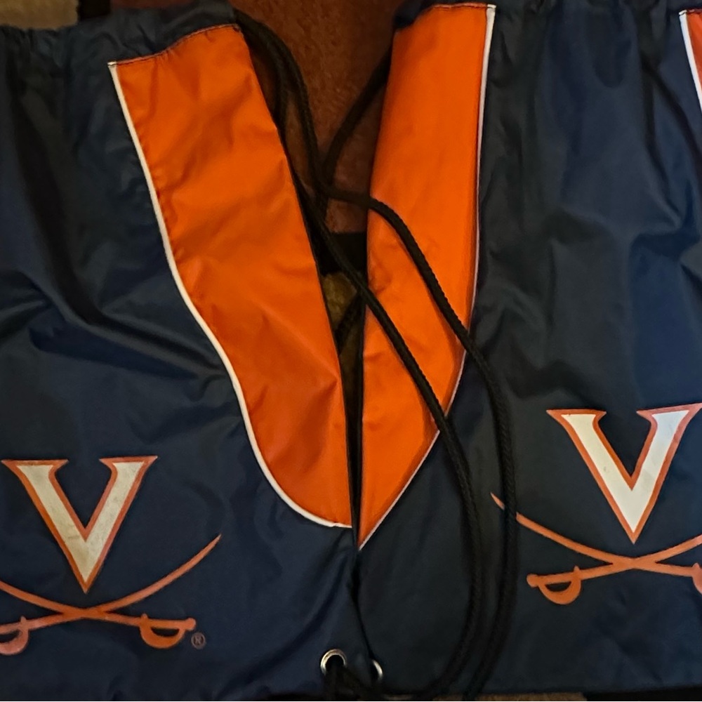 Navy and Orange Drawstring Backpack with 'V' Logo